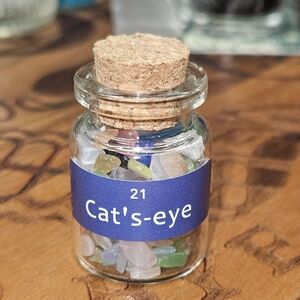#77 - Energy Healing Cat's Eye Stones in Glass Bottle